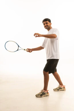 Arab Man Holding Tennis Racket on White Background