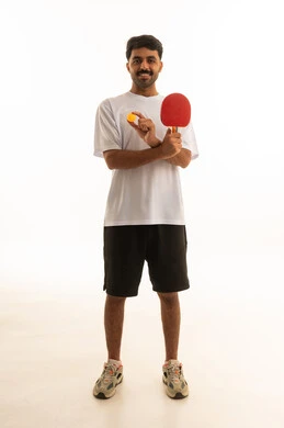 Arab Man Holding Table Tennis Racket on White Background