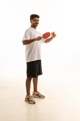 Saudi Man Holding Table Tennis Paddle in Studio