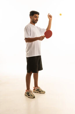 Arab Man Playing Table Tennis on White Background