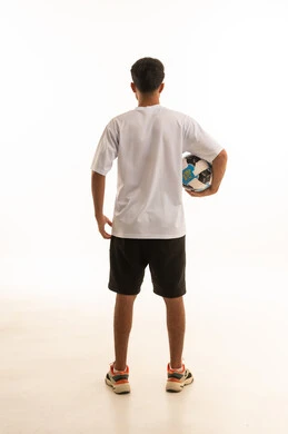Arab Soccer Player Holding Ball Back View