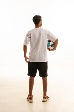 Saudi Man Holding Soccer Ball Back View in Studio