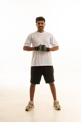 Saudi Man in Sports Wear and Gym Gloves on White Background