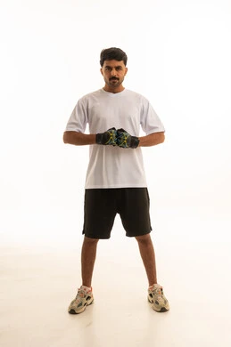 Saudi Man in Sportswear Standing on White Background