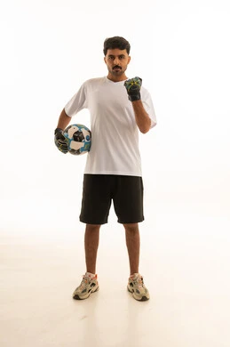 Saudi Male Goalkeeper with Football in Studio