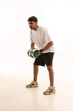Arab Goalkeeper with Soccer Ball on White Background