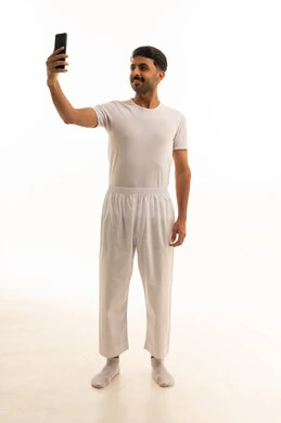 Saudi Man Taking Selfie in White Undergarments