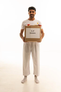 Saudi Man Holding Donation Box on White Background