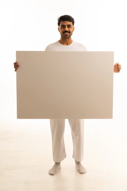 Saudi Man Holding Blank White Board in Studio