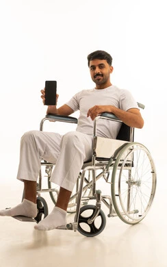 Arab Man in Wheelchair Holding Smartphone on White Background