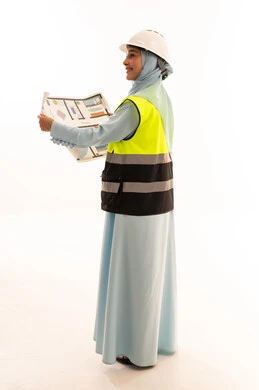 Arab Female Engineer with Safety Helmet and Blueprints