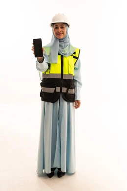 Southeast Asian Female Engineer Holding Smartphone in PPE