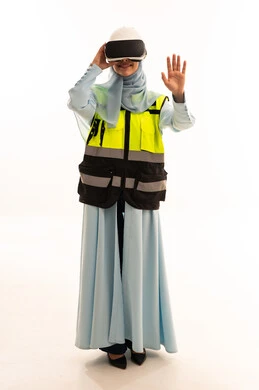 Arab Female Engineer with VR Headset and Safety Vest