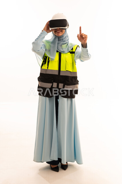 Arab Female Engineer Using VR Goggles and Safety Vest