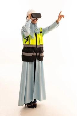Arab Female Engineer Using VR Headset in Safety Vest