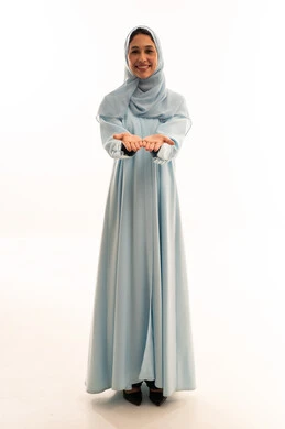 Arab Woman in Light Blue Abaya Holding Out Hands