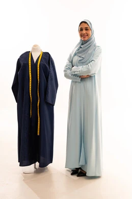 Emirati Fashion Designer with Abaya Mannequin in Studio