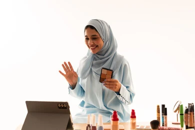 Arab Woman Wearing Hijab Hosting Online Makeup Tutorial