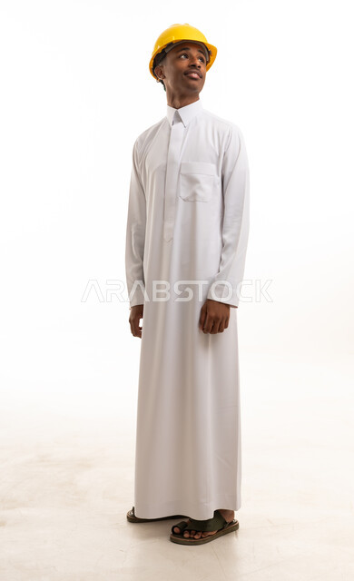 Saudi Engineer in White Thobe Wearing Safety Helmet