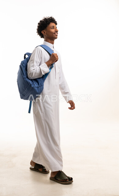 Saudi Man in White Thobe with Blue Backpack