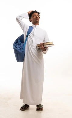 Saudi Male Student in White Thobe Holding Books