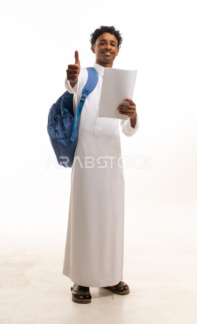Saudi Student in White Thobe Giving Thumbs Up