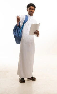 Saudi Student in White Thobe Giving Thumbs Down