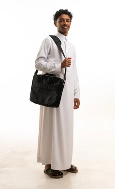 Saudi Man in Traditional Thobe Holding Messenger Bag