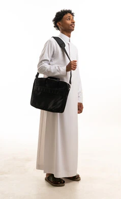 Saudi Man in White Thobe Holding Laptop Bag