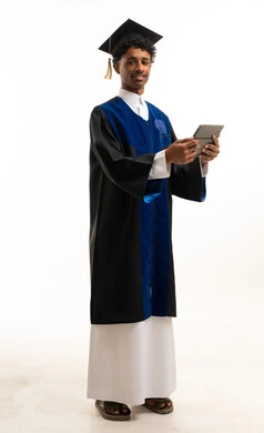 Saudi Male Student in Graduation Gown Holding Tablet