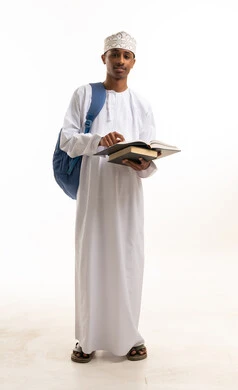 Omani Student in Traditional Dress Holding Books