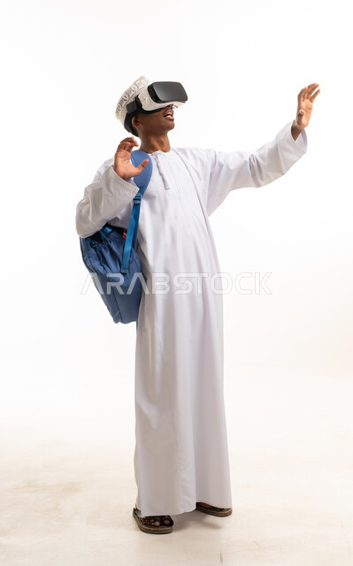 Omani Man Using VR Headset in Traditional Dress