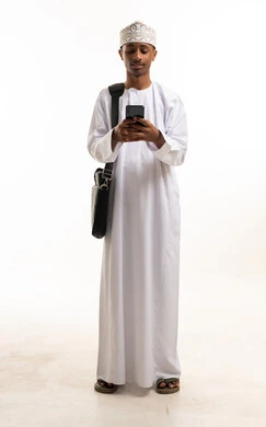 Omani Man with Smartphone and Laptop Bag