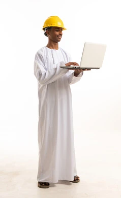 Omani Engineer in Safety Helmet with Laptop