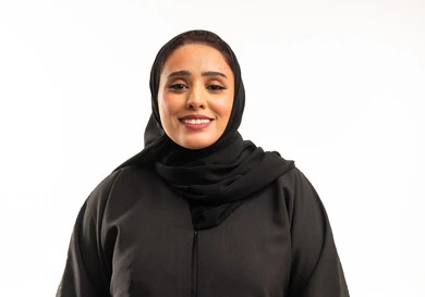 Smiling Saudi Woman in Black Abaya on White Background