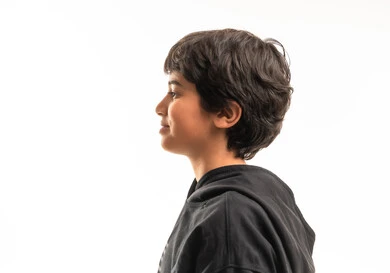 Arab Boy in Black Hoodie Profile on White Background