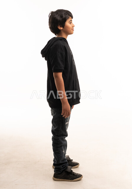 Arab Boy in Casual Wear Standing Side Profile View