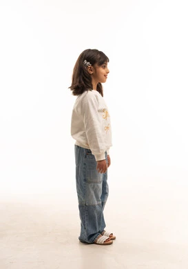 Saudi Girl in Casual White Sweatshirt and Jeans Studio Shot