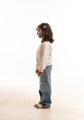 Saudi Girl in Casual Denim and White Sweatshirt Profile