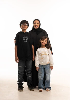 Saudi Mother with Children in Studio White Background