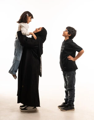Saudi Mother and Children on White Background