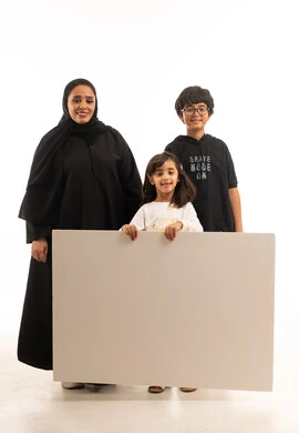 Saudi Mother and Children Holding Blank White Board