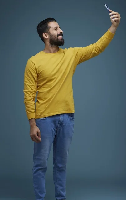 Saudi Man Taking Selfie in Casual Clothes