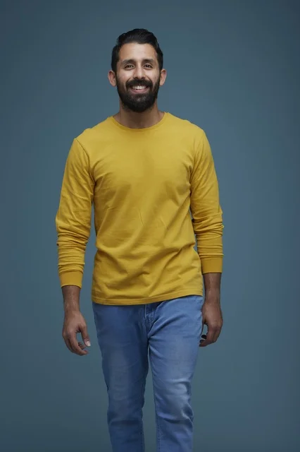 Smiling Saudi Man in Yellow Casual Shirt Studio Portrait