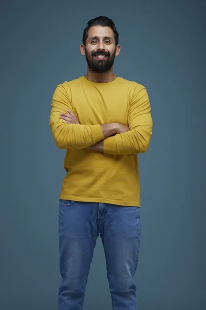 Smiling Saudi Man in Yellow Shirt Studio Portrait