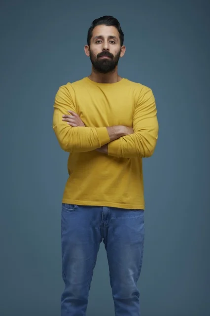 Saudi Man in Yellow Shirt and Jeans Studio Portrait