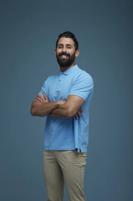 Saudi Man in Blue Polo Shirt Studio Portrait