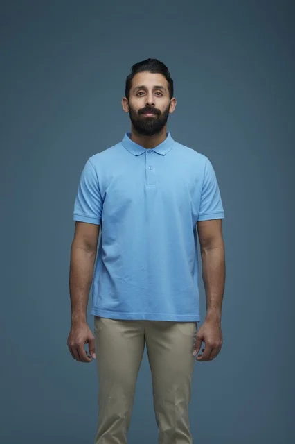 Saudi Man in Casual Polo Shirt on Blue Background