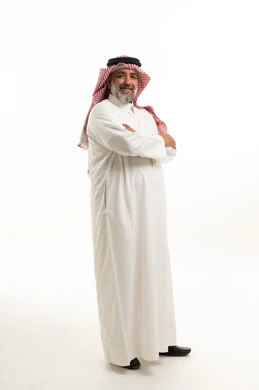 Saudi Man in Traditional Thobe Standing on White Background