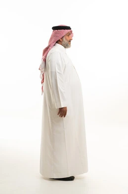 Middle-Aged Saudi Man in Traditional Thobe Side Profile